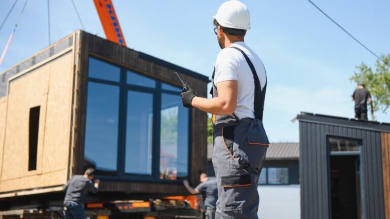 a worker at a construction site for modern method of construction