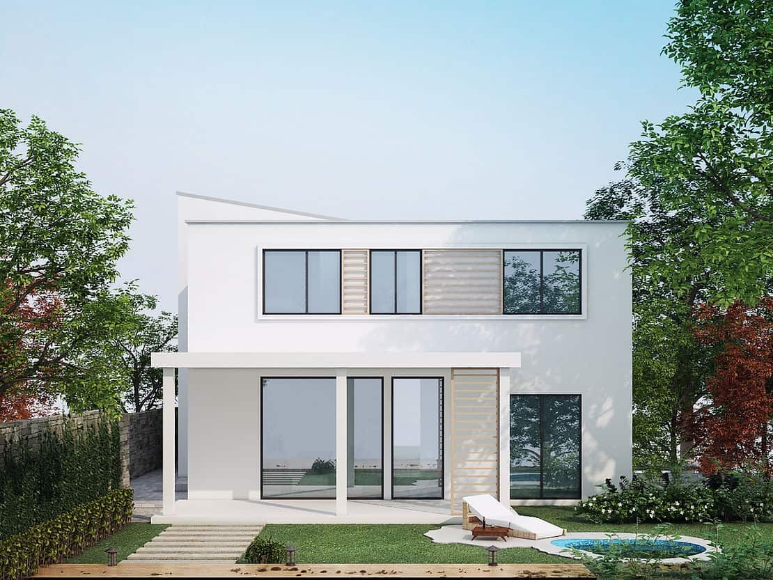 Modern white two-story house with large windows, round pool, lounge chair, and a landscaped garden with trees.