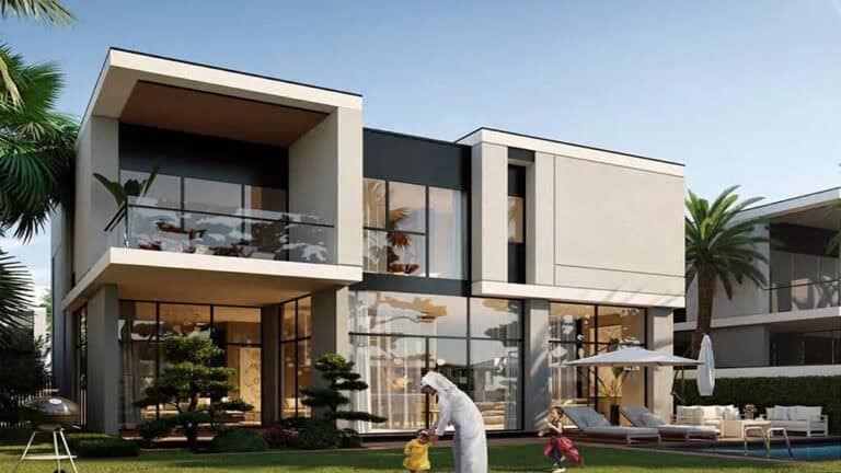 Modern two-story house with big windows and geometric design; a family with kids plays on the landscaped front lawn.