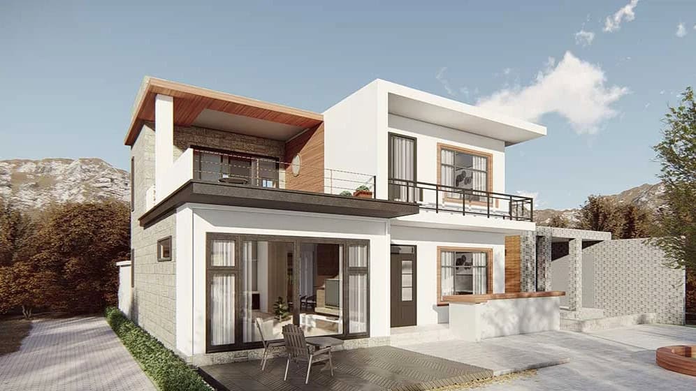 Modern two-story house with large windows, balconies, and patio, set before trees and mountains under a partly cloudy sky.