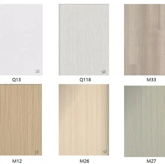 Six rectangular laminate samples labeled Q13, Q118, M33, M12, M26, and M27 in various wood and neutral tones.