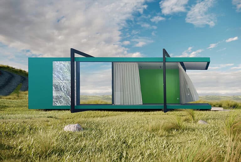 Green rectangular modular home with large glass doors, white curtains, and metal frame on grass under partly cloudy sky.