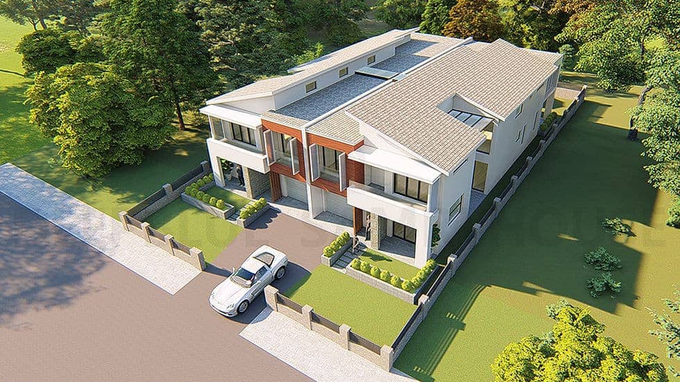 Aerial view of a two-story duplex with a car in the driveway, green lawns, trees, and a low boundary wall.