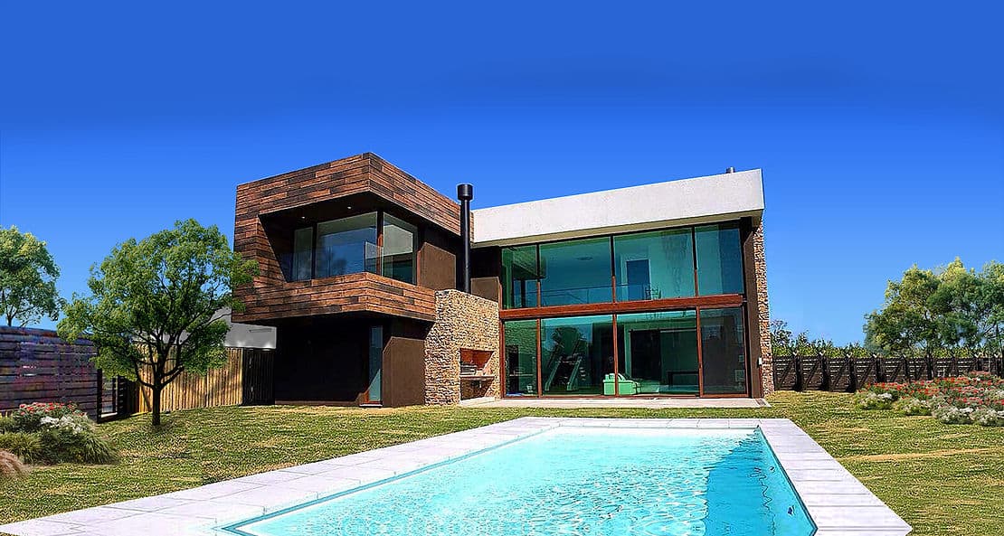 Modern two-story house with glass windows, wood and stone exterior, and a backyard pool under a clear blue sky.