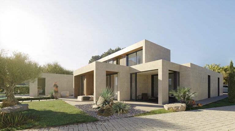Modern two-story house with flat roof, large windows, beige stone exterior, landscaped plants, and paved walkway.