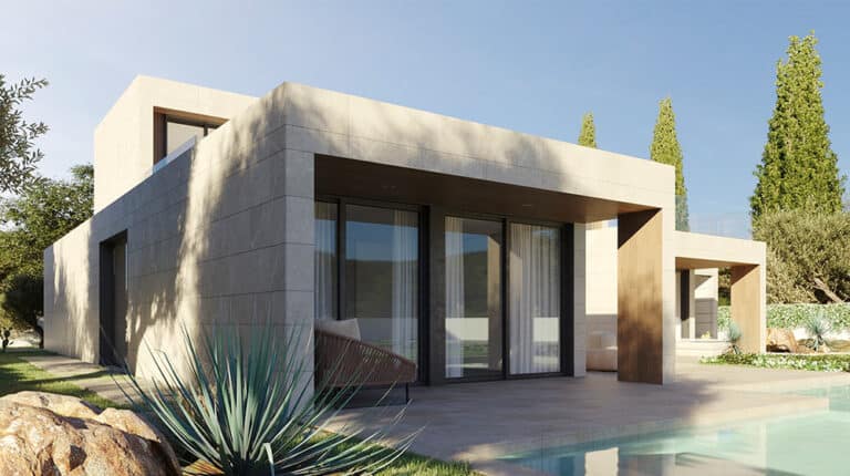 Minimalist beige house with large windows, flat roof, greenery, and a pool in front under a clear sky.
