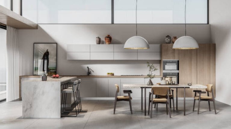 Bright modern kitchen with minimalist design, featuring white cabinetry, wooden accents, and a sleek marble island, perfect for contemporary home living and cooking enthusiasts.