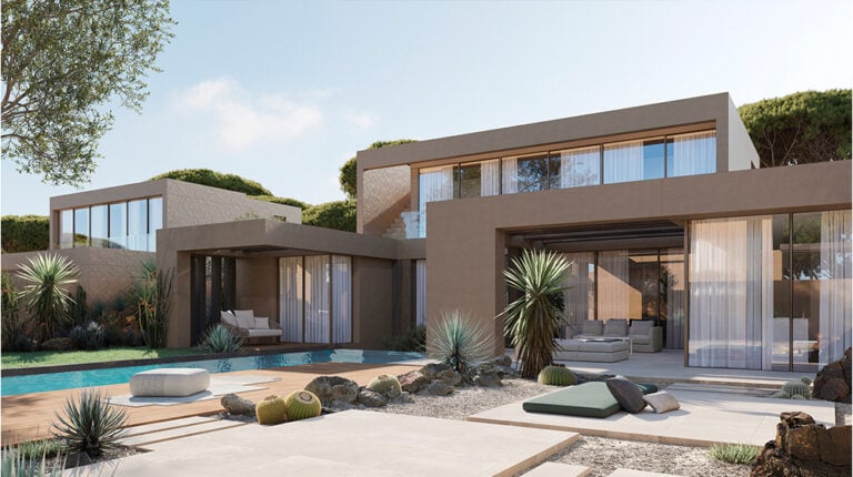 Modern luxury house with large glass windows, desert landscaping, and outdoor seating areas, showcasing contemporary architectural design and a private swimming pool.