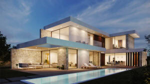 Modern luxury home with sleek design, clean white walls, stone accents, expansive glass windows, outdoor patio with seating, and a pool, all illuminated under a twilight sky.