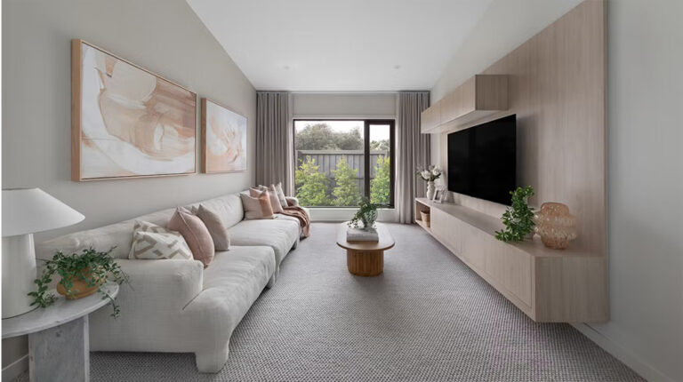 Modern minimalist living room featuring neutral tones, contemporary decor, and large window with natural light, perfect for stylish home interior design.