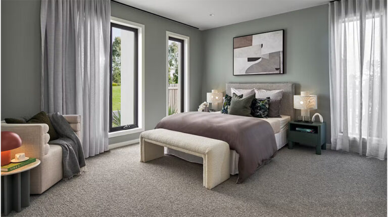 Bright modern bedroom with large windows, minimalist decor, and neutral color palette for relaxing living spaces.