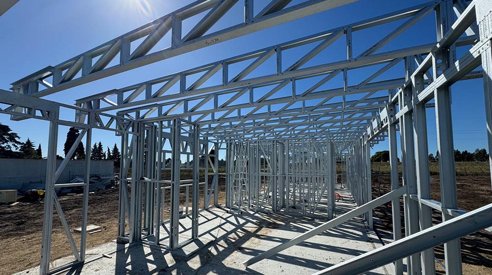 1. Steel framing construction for custom residential or commercial building, showcasing durable metal framework for modern architecture.