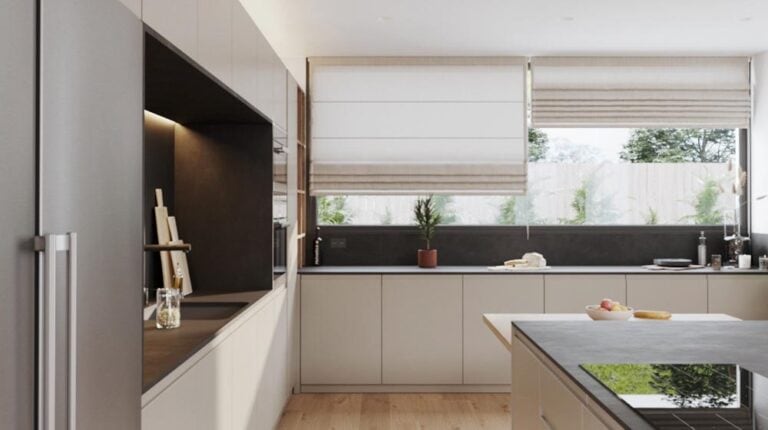 Bright modern kitchen with sleek cabinetry, large windows, and minimalistic decor for a stylish, functional home environment.