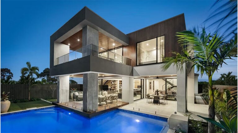 Stunning contemporary house featuring large glass windows, outdoor pool, tropical landscaping, and modern architecture, showcasing luxury living and stylish design.