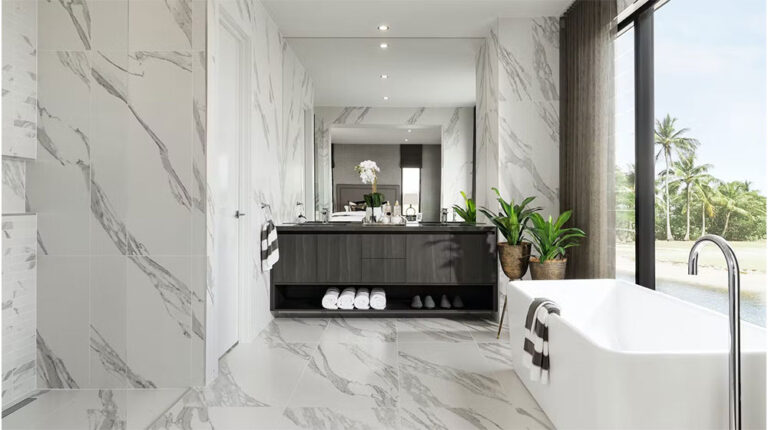 Spacious modern bathroom featuring elegant marble tiles, a stylish freestanding tub, large windows with scenic views, and contemporary decor accented by green plants for a relaxing oasis.