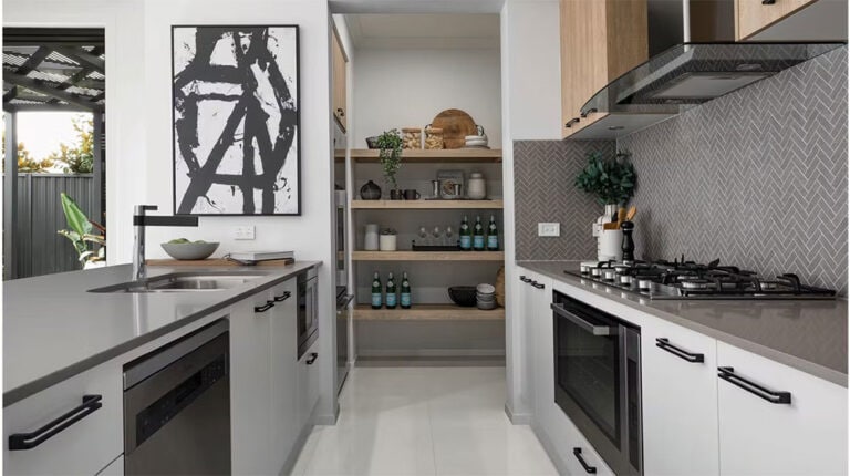 Bright and contemporary kitchen with sleek cabinetry, open shelving, and modern appliances. Perfect for stylish cooking and entertaining, featuring neutral tones and functional layout.
