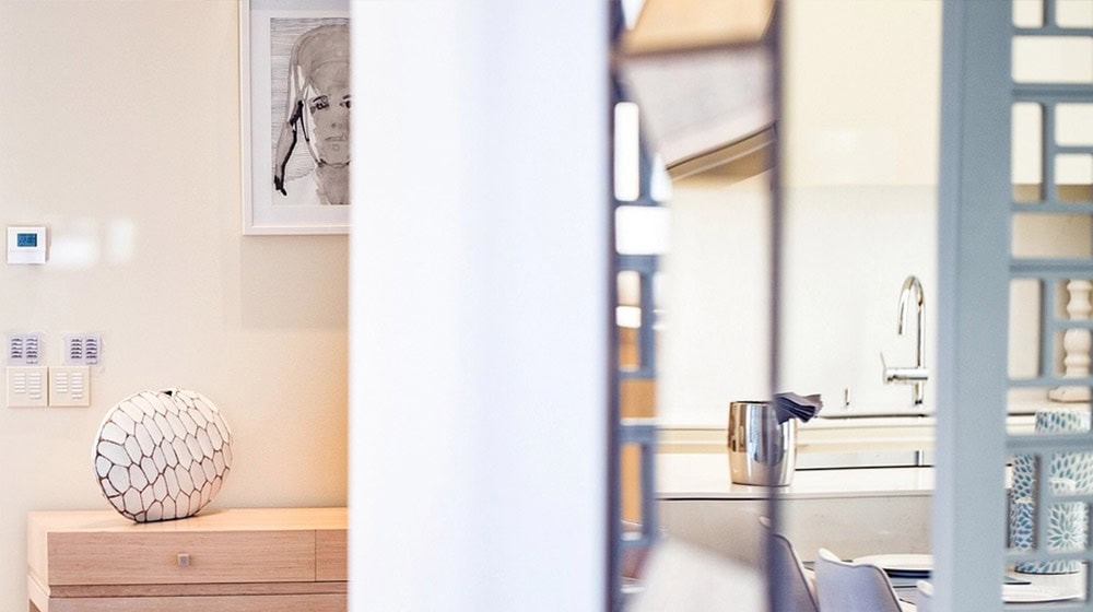 Bright contemporary kitchen space with sleek finishes and functional decor.