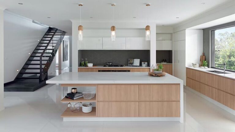Bright and airy kitchen with clean lines, minimalist design, natural wood finishes, large window for sunlight, and modern decor perfect for stylish living.