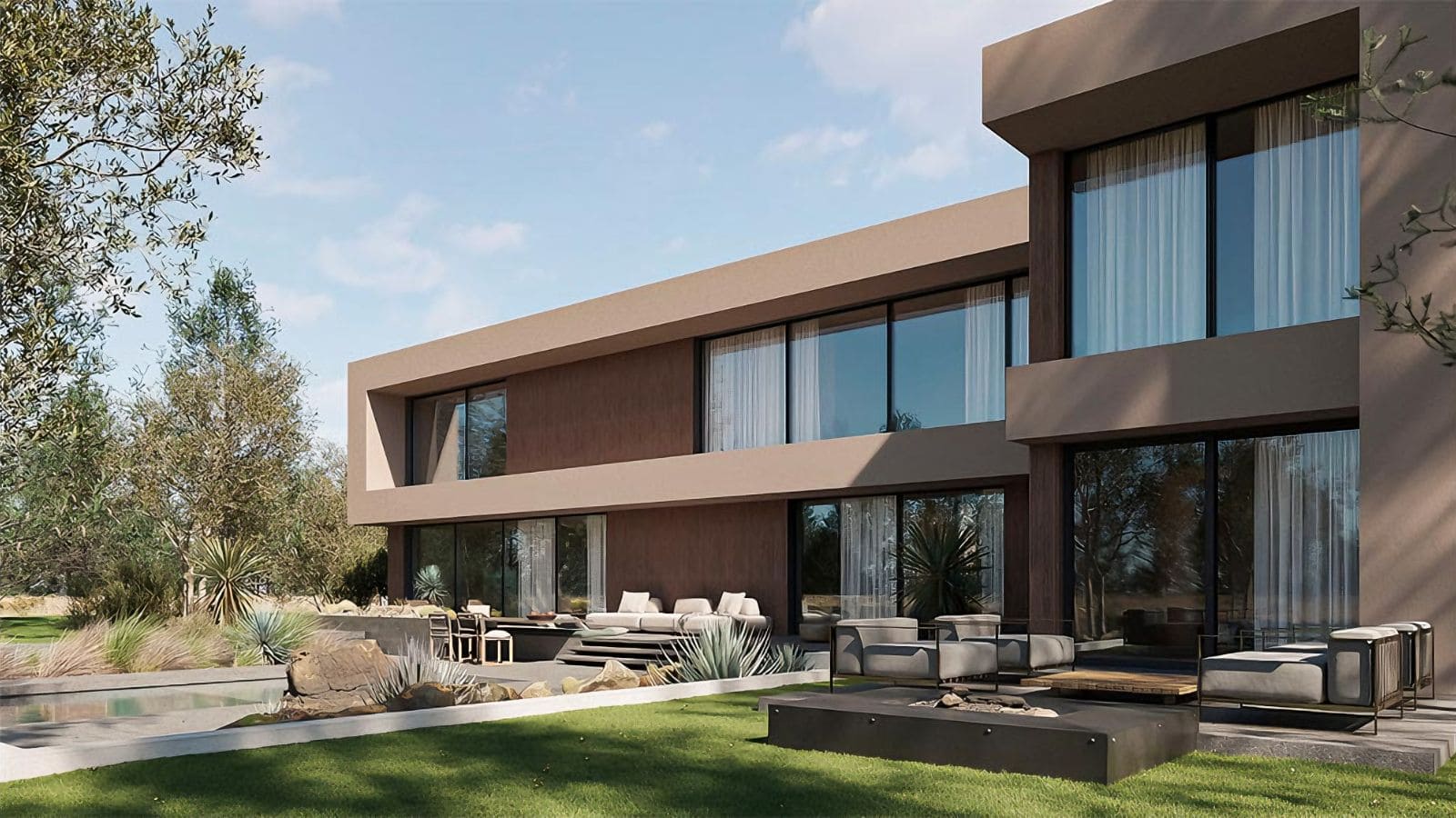 a modular home with large glass windows, outdoor seating area, and landscaped garden perfect for contemporary living and outdoor entertaining.