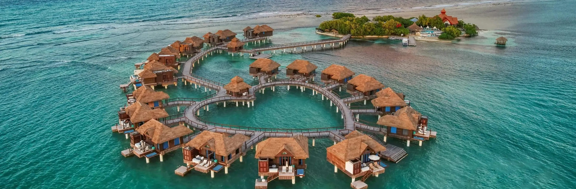 Overwater bungalows in the Maldives with private pools and stunning ocean views.