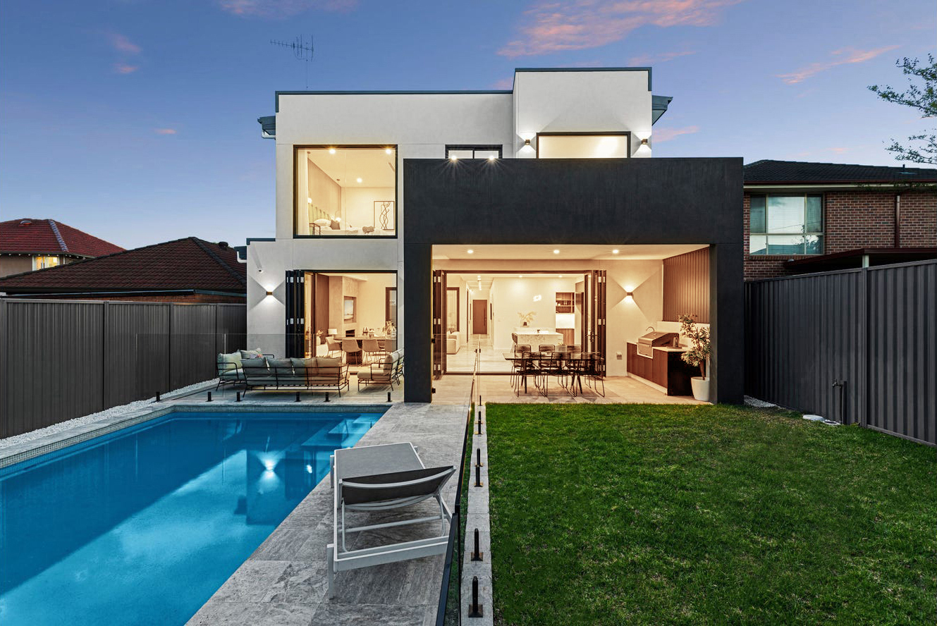 Modern Open-Plan Living Room with Large Windows and Garden View ...