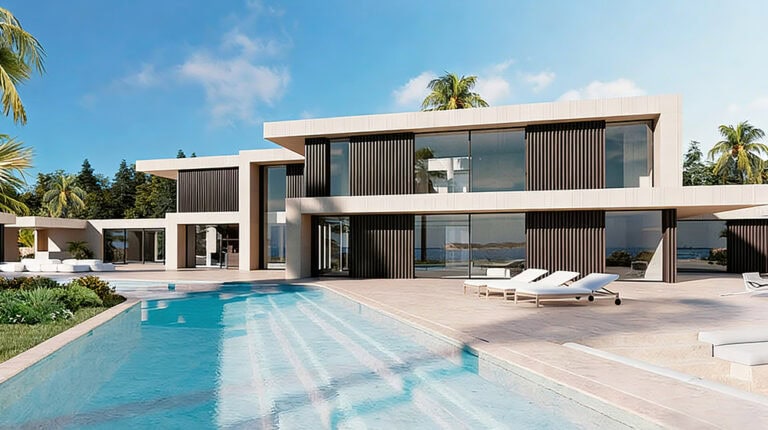 Luxurious modern Champagne House villa featuring a sleek design, expansive glass windows, and a private pool, set amidst lush tropical landscaping for an exclusive and elegant experience.