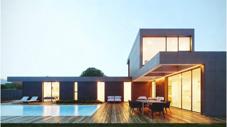 Contemporary luxury home featuring a sleek design, large glass windows, outdoor pool, and stylish lounge area, perfect for modern living and outdoor entertainment.