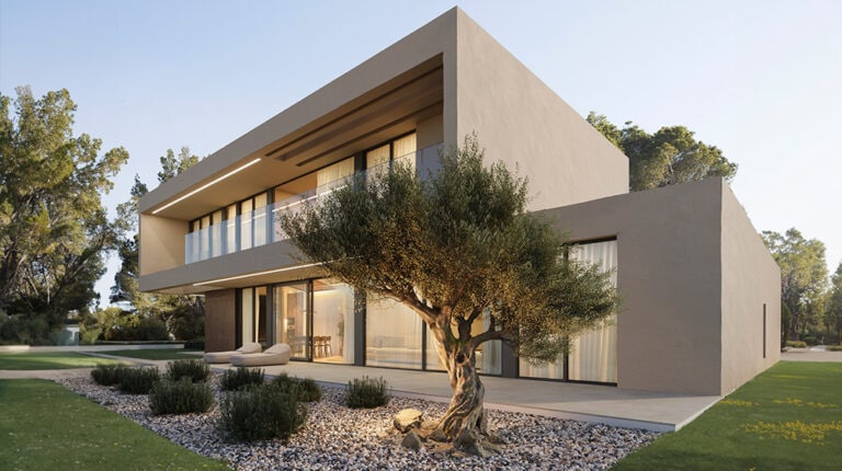 Contemporary minimalist house featuring large glass windows, a flat roof, and a landscaped garden with a prominent tree, showcasing modern architecture and outdoor living space.