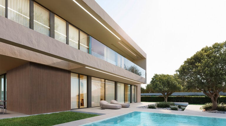 Contemporary modern house featuring large glass windows, a private swimming pool, and a well-maintained landscaped yard, perfect for luxury living and outdoor relaxation.