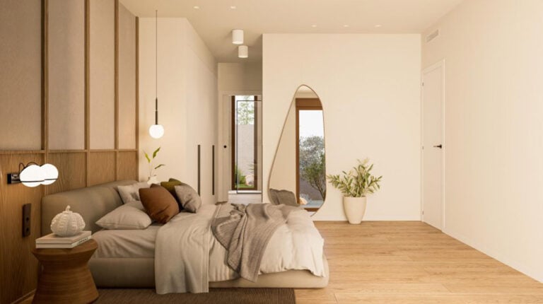 Bright and airy bedroom in Suva House featuring minimalist decor, neutral tones, and wooden accents, creating a calm and inviting atmosphere. Perfect for relaxing and enjoying natural sunlight.