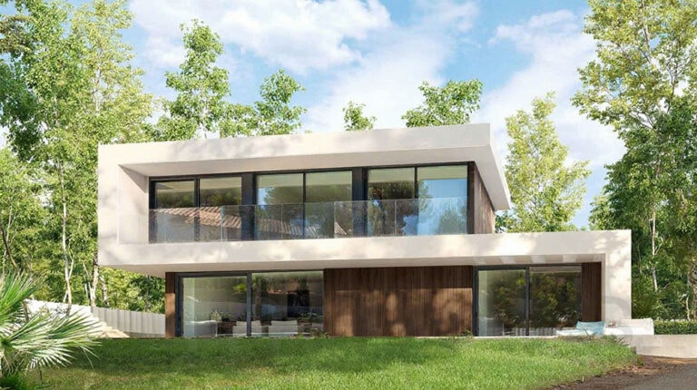 Modern Teurel House with large glass windows, minimalist design, and lush green trees in the background, showcasing contemporary architecture and sustainable living.