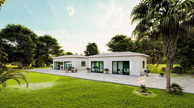 Contemporary white house featuring expansive glass windows, surrounded by vibrant green lawn and tropical trees, ideal for modern outdoor living and scenic views.