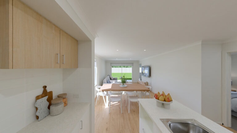 Modern minimalist kitchen and dining space with bright, airy design, light wood cabinets, white countertops, and a cozy dining table with chairs, perfect for family meals and entertaining.