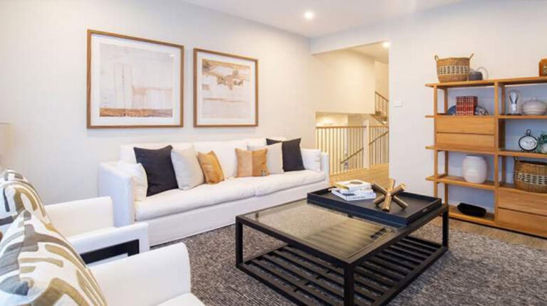 Bright and stylish living room in Cairo house with contemporary furniture and decor.