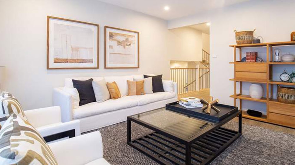 Bright and stylish living room in Cairo house with contemporary furniture and decor.