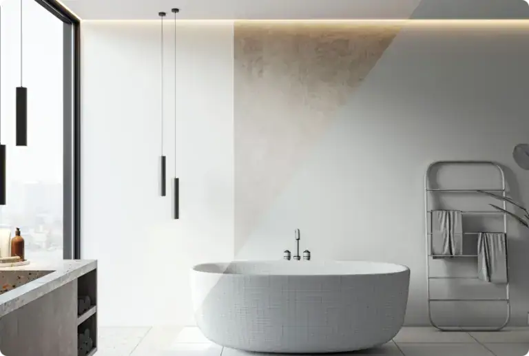 Modern freestanding bathtub in a minimalist bathroom with natural light, featuring sleek design, neutral tones, and contemporary fixtures. Perfect for a luxurious, relaxing bath experience.