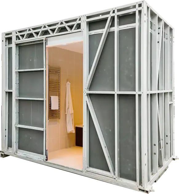 Modern prefabricated bathroom unit with steel frame and interior fixtures, ideal for quick installation and space-efficient design.