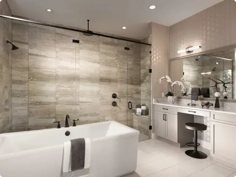 Elegant modern bathroom featuring a white bathtub, a vanity with a large mirror, and stylish decor, perfect for a luxurious home spa experience.