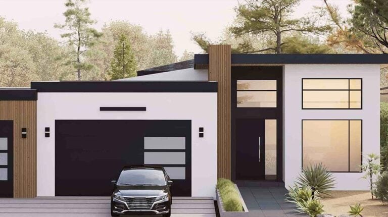 Contemporary Nantes house with sleek design, large windows, and modern facade, showcasing stylish architecture and landscaping in a serene setting.