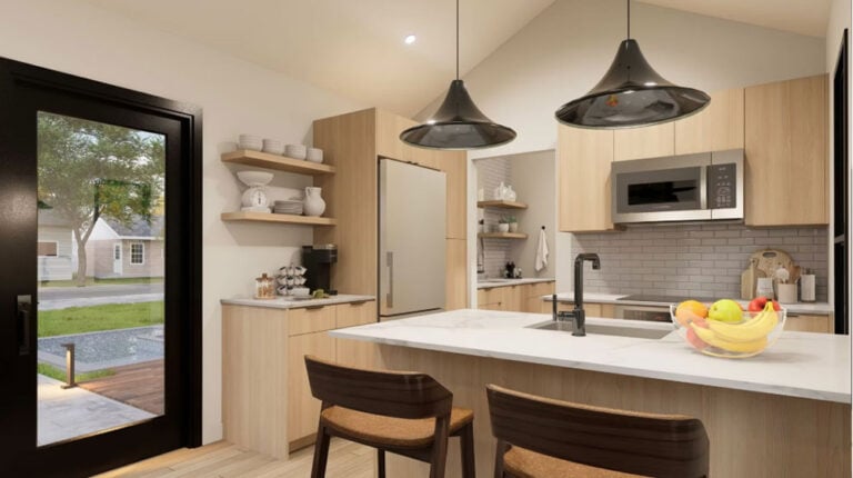Modern minimalist kitchen featuring natural wood cabinetry, a white countertop island, stainless steel appliances, and pendant lighting, creating a bright and inviting space.
